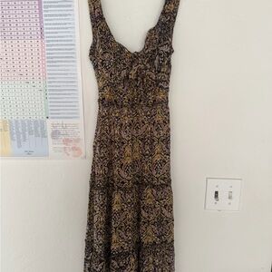 Angie’s Elegant Black and Gold Patterned Dress